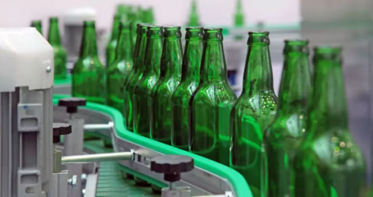 glass bottles for beer on factory line